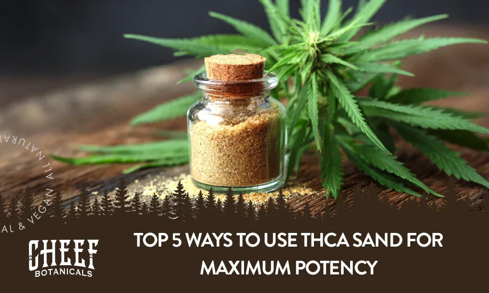 THCa sand sitting on a wooden table with a cannabis plant behind it.