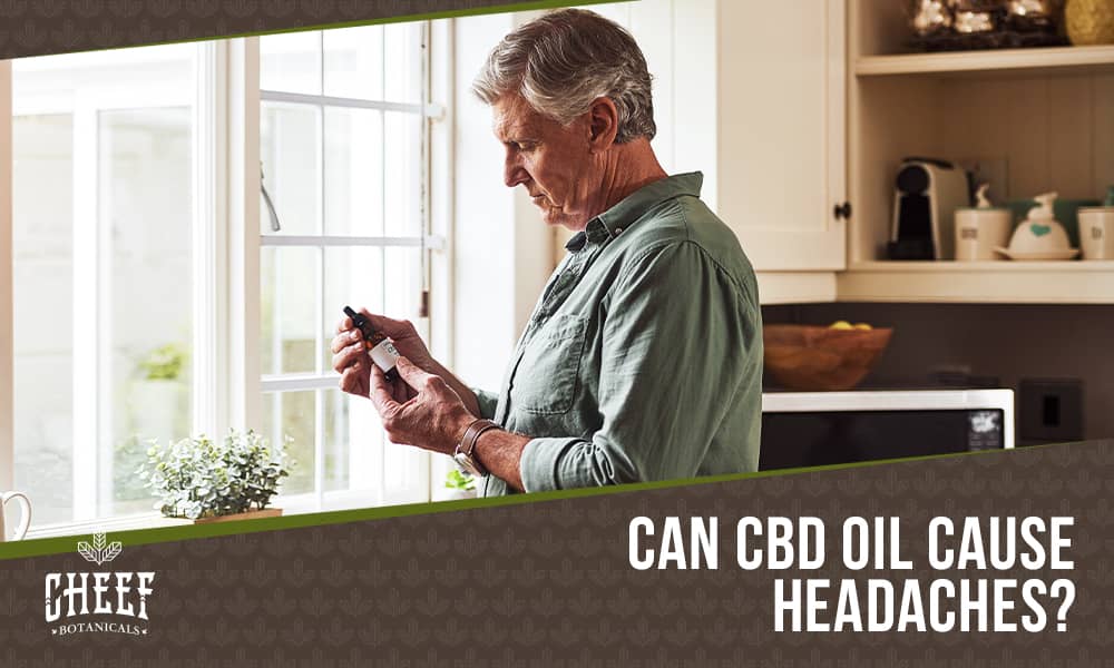 Can CBD Oil Cause Headaches (featured blog image by Cheef Botanicals). Shows a man looking at a bottle of CBD tincture oil.