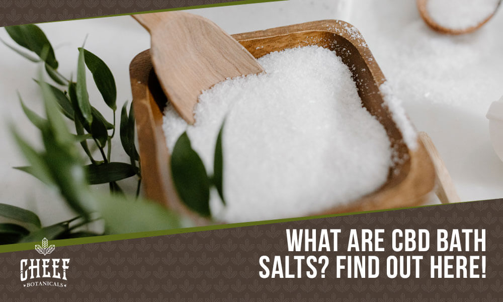 Featured blog image by Cheef Botanicals showing white bath salts in a wooden bowl with the text “What Are CBD Bath Salts? Find Out Here!” highlighting CBD bath salts.