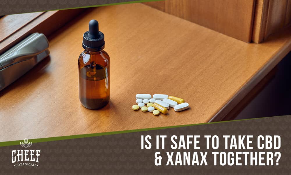 CBD oil and Xanax featured blog image by Cheef Botanicals. Shows a bottle of CBD oil next to different Xanax pills. 
